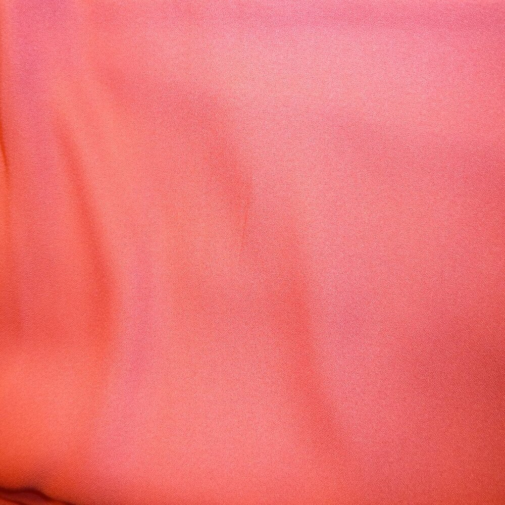 Luxurious fabric in solid coral pink
